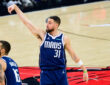 NBA: Klay Thompson holds his follow-through after making a three-pointer for the Dallas Mavericks against the Chicago Bulls