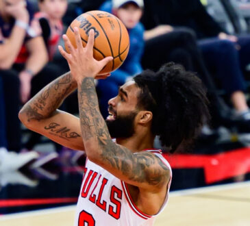 NBA: Coby White shoots a floater for the Chicago Bulls against the Dallas Mavericks at United Center