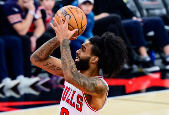NBA: Coby White shoots a floater for the Chicago Bulls against the Dallas Mavericks at United Center
