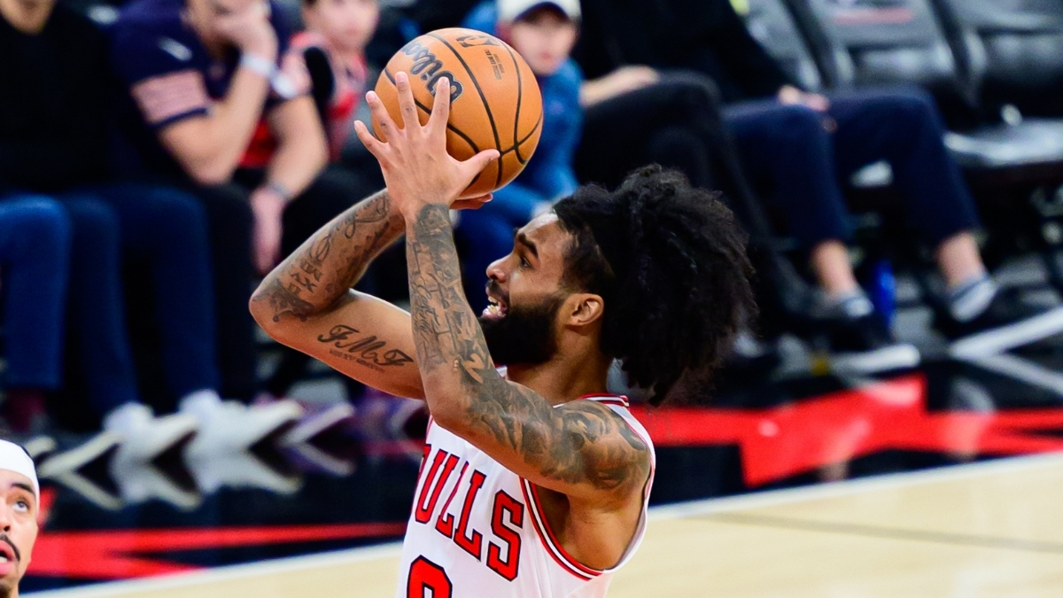 NBA: Coby White shoots a floater for the Chicago Bulls against the Dallas Mavericks at United Center