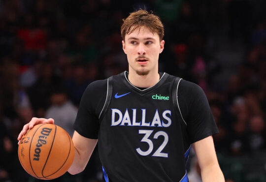 NBA: Cooper Flagg controls the ball for the Dallas Mavericks during the second half against the Golden State Warriors at American Airlines Center