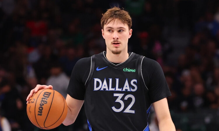NBA: Cooper Flagg controls the ball for the Dallas Mavericks during the second half against the Golden State Warriors at American Airlines Center
