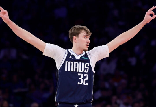 Cooper Flagg celebrates after making a three-pointer for the Dallas Mavericks against the New York Knicks at Madison Square Garden