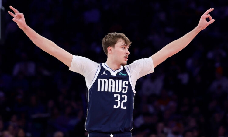 Cooper Flagg celebrates after making a three-pointer for the Dallas Mavericks against the New York Knicks at Madison Square Garden