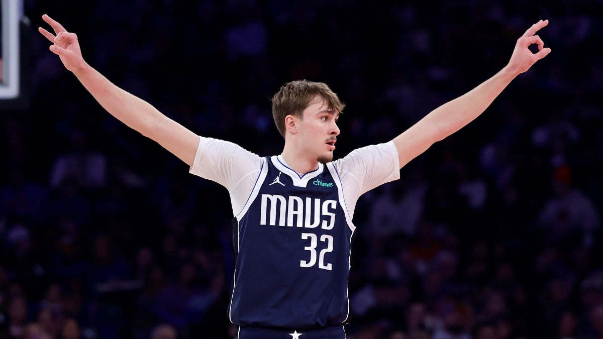 Cooper Flagg celebrates after making a three-pointer for the Dallas Mavericks against the New York Knicks at Madison Square Garden