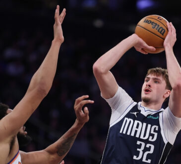Dallas Mavericks forward Cooper Flagg shoots over New York Knicks center Karl-Anthony Towns during a Jan. 19, 2026 game at Madison Square Garden.