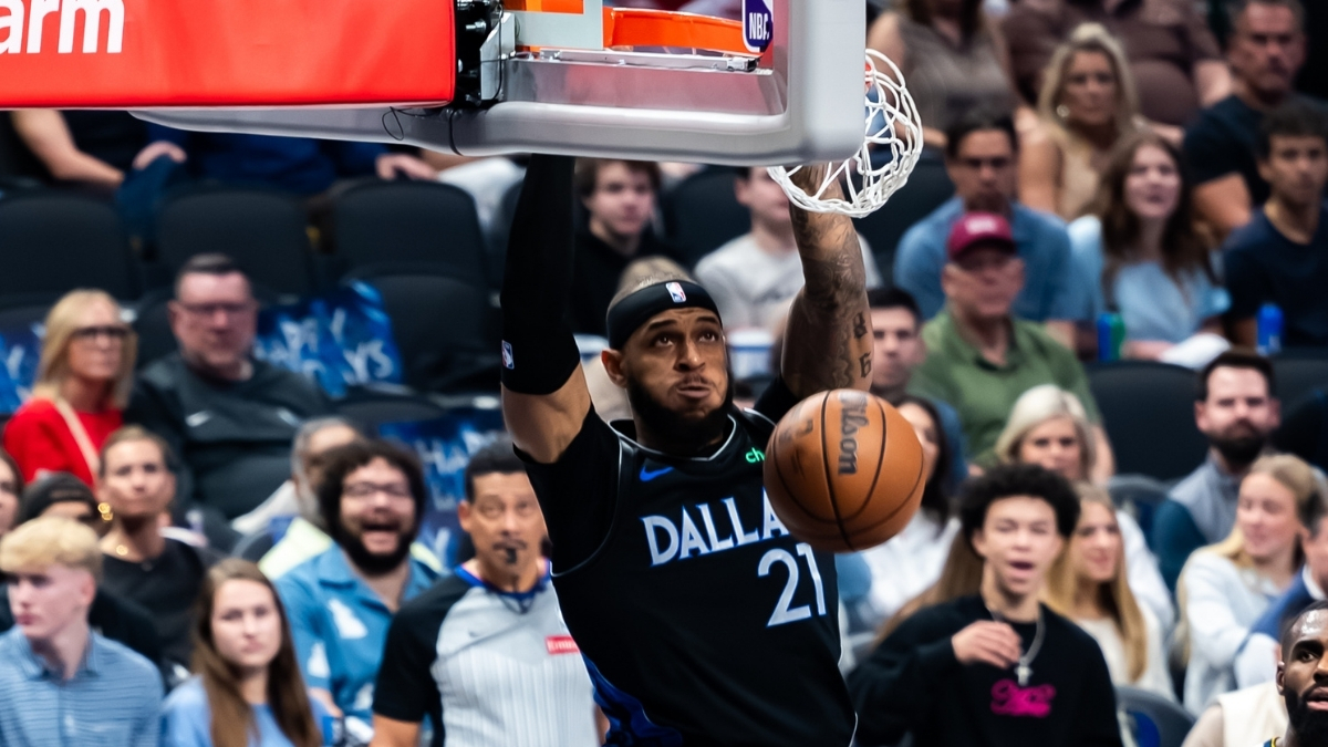 Daniel Gafford dunks the ball for the Dallas Mavericks against the Denver Nuggets
