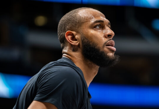 Daniel Gafford shoots jump shots during pregame warmups for the Dallas Mavericks before facing the Denver Nuggets