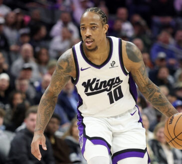 DeMar DeRozan dribbles the ball for the Sacramento Kings against the Toronto Raptors at Golden 1 Center