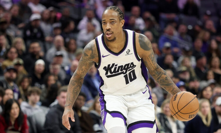 DeMar DeRozan dribbles the ball for the Sacramento Kings against the Toronto Raptors at Golden 1 Center