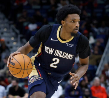 NBA: Herbert Jones drives to the basket for the New Orleans Pelicans against the Portland Trail Blazers at Smoothie King Center