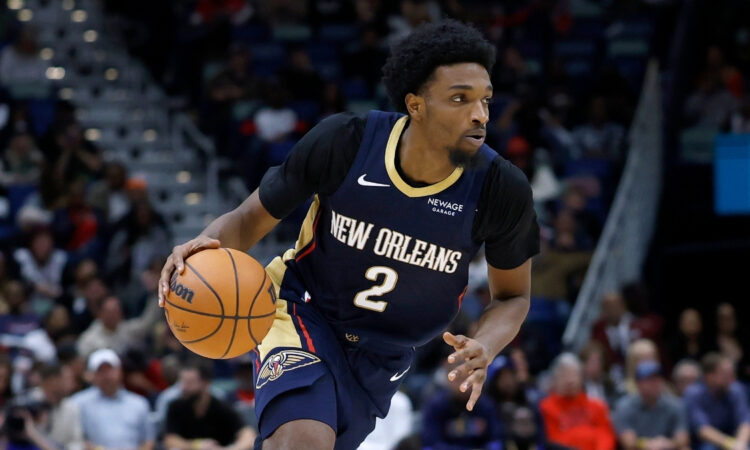 NBA: Herbert Jones drives to the basket for the New Orleans Pelicans against the Portland Trail Blazers at Smoothie King Center