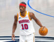 Jimmy Butler dribbles the ball for the Golden State Warriors against the Dallas Mavericks at American Airlines Center