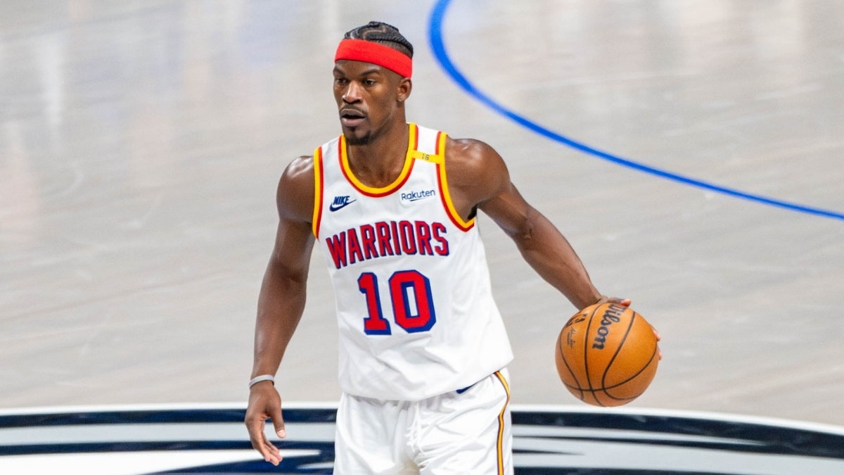 Jimmy Butler dribbles the ball for the Golden State Warriors against the Dallas Mavericks at American Airlines Center