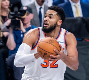 Karl-Anthony Towns prepares to shoot a jump shot for the New York Knicks against the Dallas Mavericks at American Airlines Center