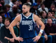 Klay Thompson stands with his hands on his hips during the Dallas Mavericks’ game against the Philadelphia 76ers at American Airlines Center