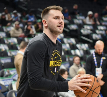 Luka Dončić shoots during pregame warmups for the Los Angeles Lakers at American Airlines Center
