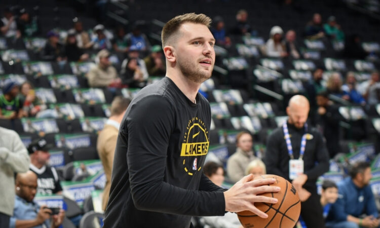 Luka Dončić shoots during pregame warmups for the Los Angeles Lakers at American Airlines Center