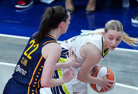 WNBA: Paige Bueckers of the Dallas Wings is guarded by Caitlin Clark of the Indiana Fever at Gainbridge Fieldhouse