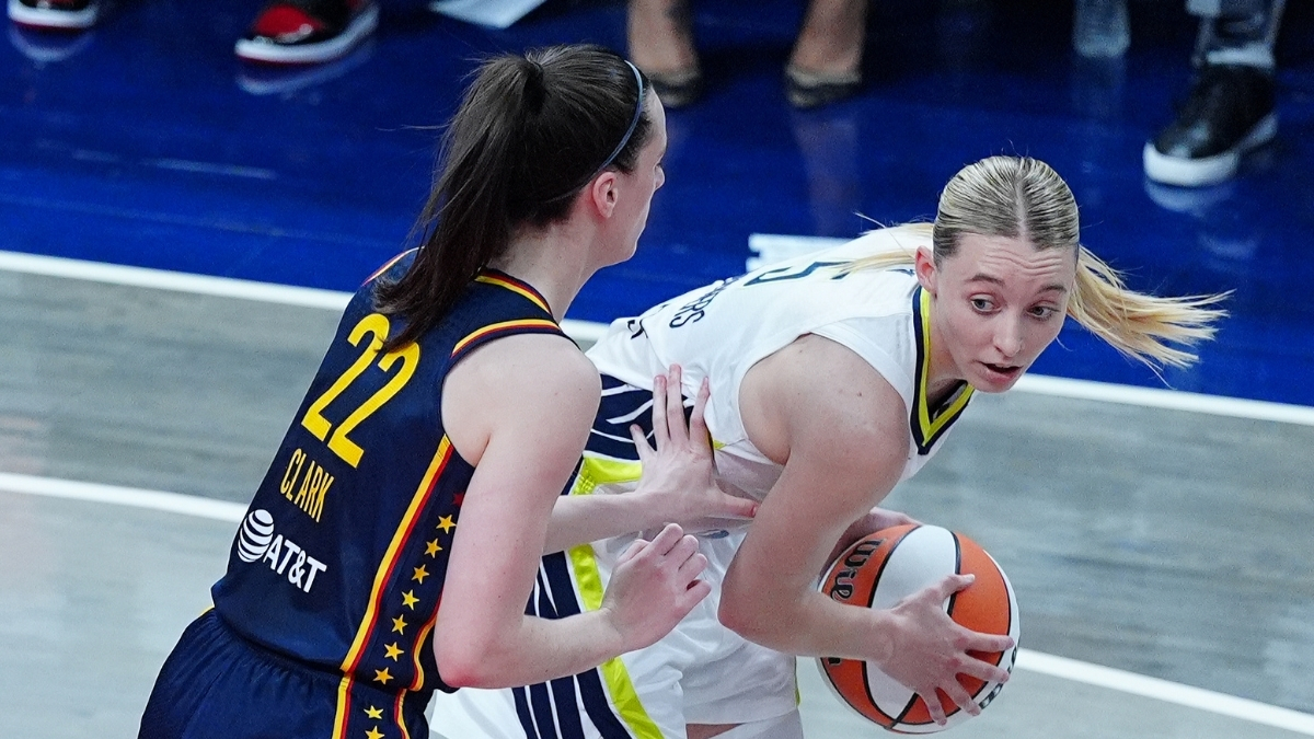 WNBA: Paige Bueckers of the Dallas Wings is guarded by Caitlin Clark of the Indiana Fever at Gainbridge Fieldhouse