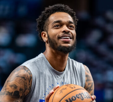 P.J. Washington shoots free throws during a pregame workout at American Airlines Center before Mavericks vs. Nets