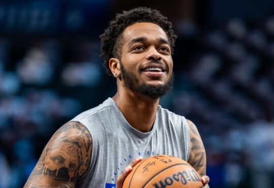 P.J. Washington shoots free throws during a pregame workout at American Airlines Center before Mavericks vs. Nets