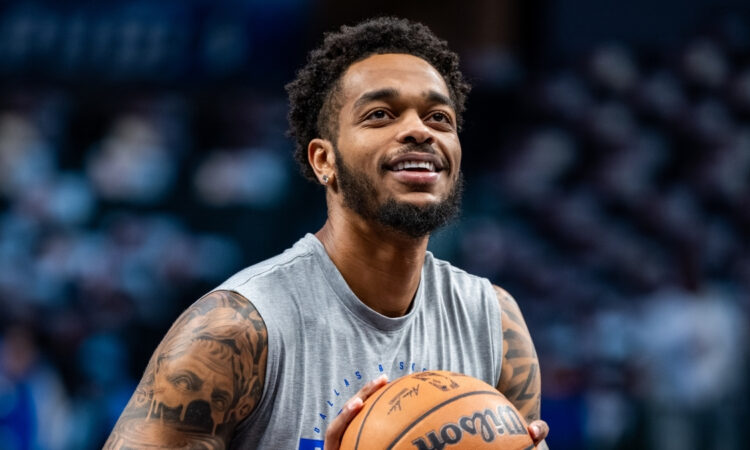 P.J. Washington shoots free throws during a pregame workout at American Airlines Center before Mavericks vs. Nets