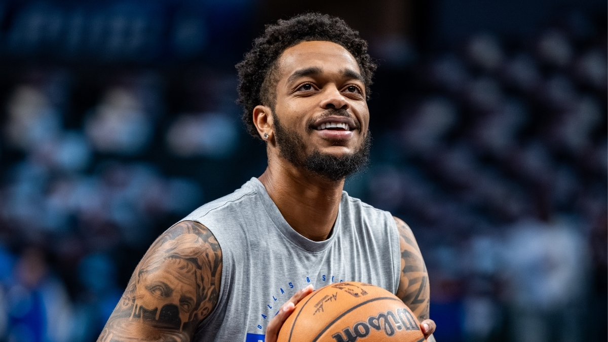 P.J. Washington shoots free throws during a pregame workout at American Airlines Center before Mavericks vs. Nets