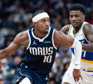 NBA: Brandon Williams dribbles against Kam Jones at Gainbridge Fieldhouse during the Dallas Mavericks' game against the Indiana Pacers.