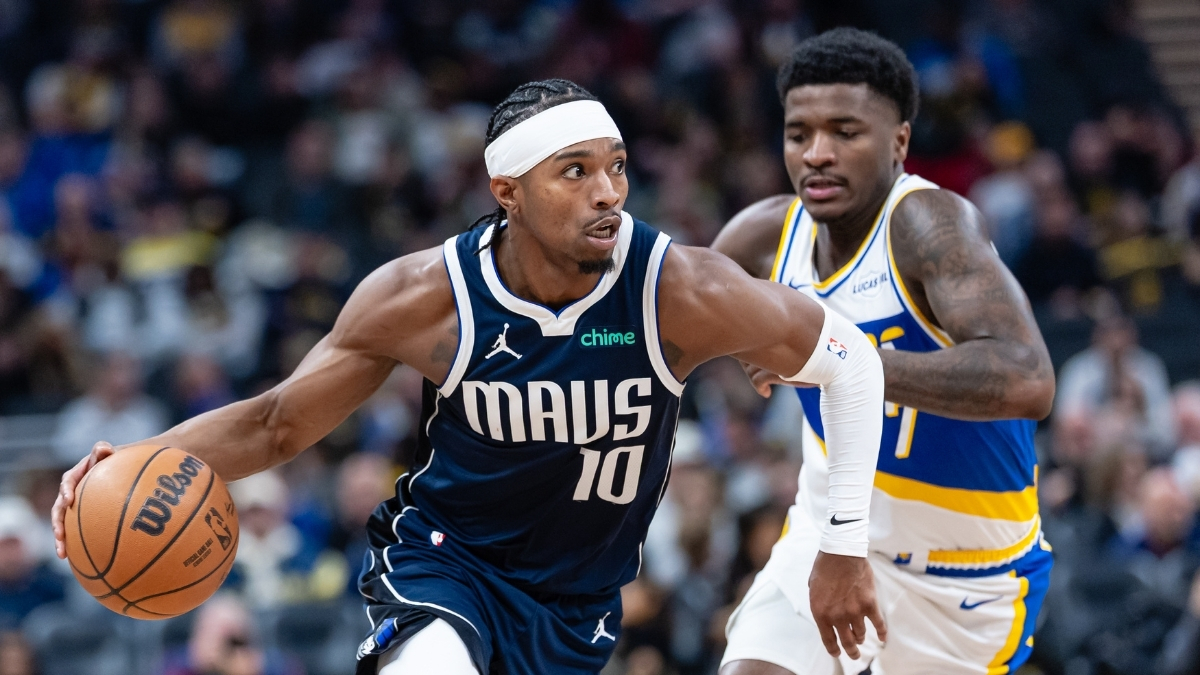 NBA: Brandon Williams dribbles against Kam Jones at Gainbridge Fieldhouse during the Dallas Mavericks' game against the Indiana Pacers.