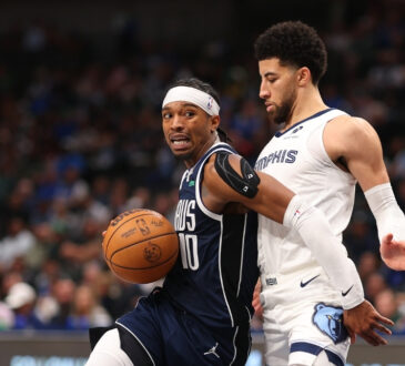 NBA: Brandon Williams drives the ball for the Dallas Mavericks while defended by Scotty Pippen Jr. of the Memphis Grizzlies during the fourth quarter at American Airlines Center.