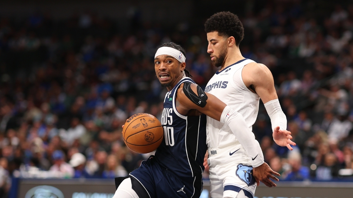 NBA: Brandon Williams drives the ball for the Dallas Mavericks while defended by Scotty Pippen Jr. of the Memphis Grizzlies during the fourth quarter at American Airlines Center.