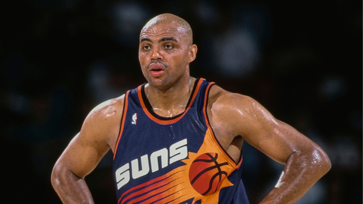 NBA: Charles Barkley looks on with his hands on his hips during a Phoenix Suns game against the Denver Nuggets at McNichols Sports Arena.