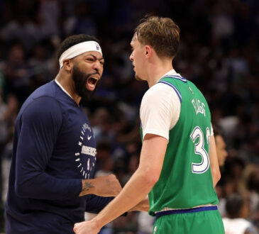 NBA: Cooper Flagg celebrates a score with Anthony Davis during the second half at American Airlines Center against the Toronto Raptors.