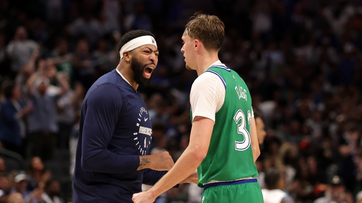 NBA: Cooper Flagg celebrates a score with Anthony Davis during the second half at American Airlines Center against the Toronto Raptors.