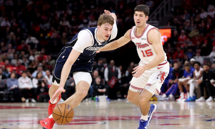 NBA: Cooper Flagg drives to the basket for the Dallas Mavericks against the Houston Rockets at Toyota Center