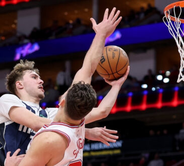 NBA: Cooper Flagg shoots the ball for the Dallas Mavericks against Alperen Sengun of the Houston Rockets at Toyota Center