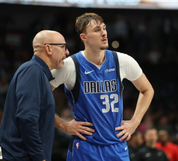 NBA: Cooper Flagg speaks with head coach Jason Kidd on the court at American Airlines Center during Mavericks vs. Pelicans