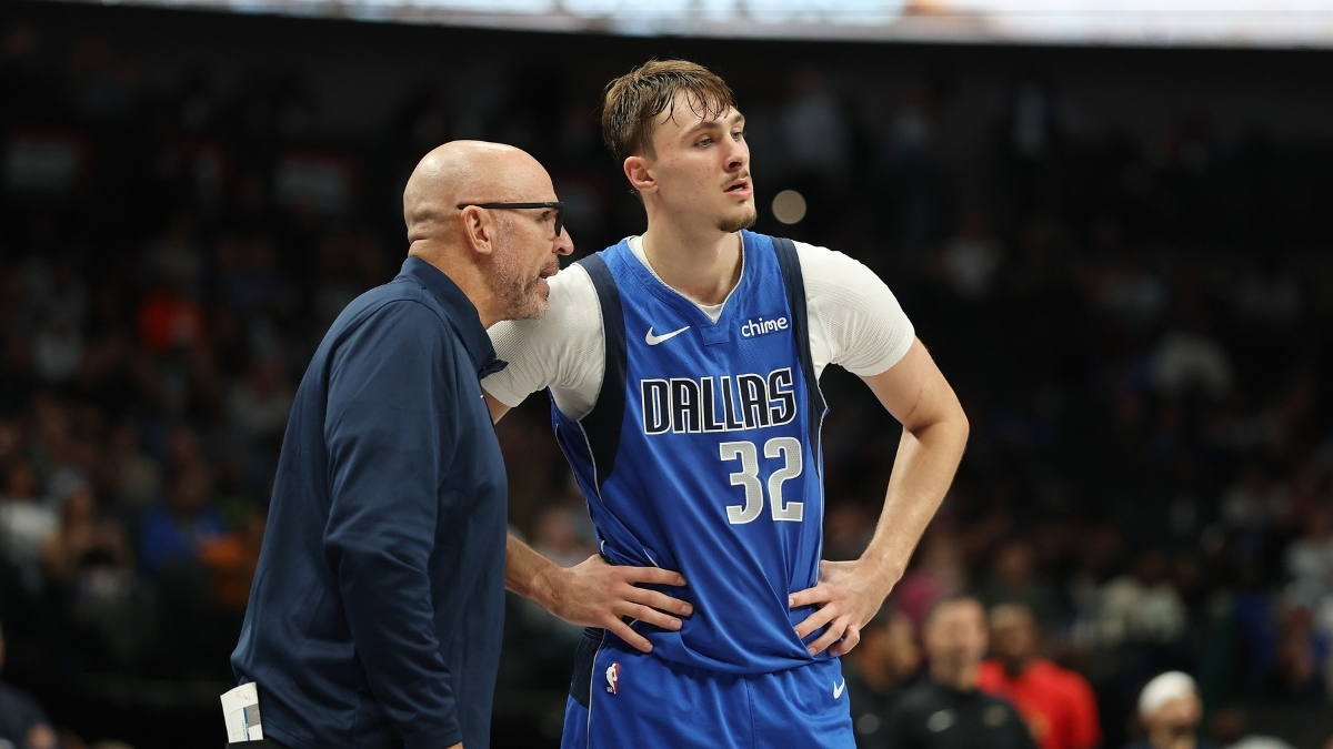 NBA: Cooper Flagg speaks with head coach Jason Kidd on the court at American Airlines Center during Mavericks vs. Pelicans