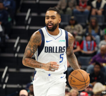 NBA: D’Angelo Russell dribbles the ball up the court for the Dallas Mavericks against the Memphis Grizzlies at FedExForum