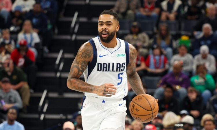 NBA: D’Angelo Russell dribbles the ball up the court for the Dallas Mavericks against the Memphis Grizzlies at FedExForum