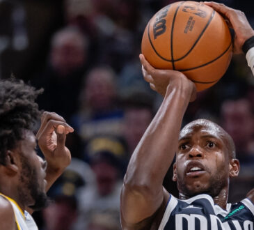 NBA: Khris Middleton shoots the ball for the Dallas Mavericks against the Indiana Pacers at Gainbridge Fieldhouse.