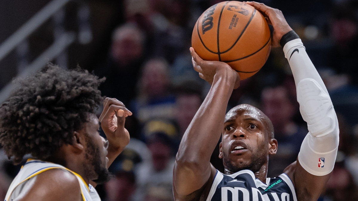 NBA: Khris Middleton shoots the ball for the Dallas Mavericks against the Indiana Pacers at Gainbridge Fieldhouse.