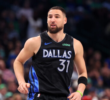 NBA: Klay Thompson watches his shot during the second quarter at American Airlines Center against the Boston Celtics