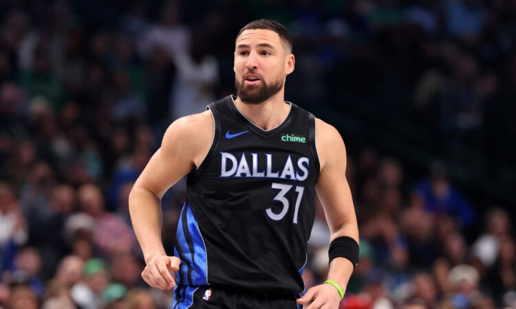 NBA: Klay Thompson watches his shot during the second quarter at American Airlines Center against the Boston Celtics
