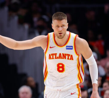 NBA: Kristaps Porzingis reacts during the first quarter for the Atlanta Hawks against the New Orleans Pelicans at State Farm Arena.