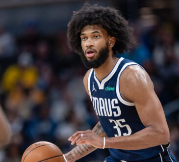 NBA: Marvin Bagley III dribbles the ball for the Dallas Mavericks against the Indiana Pacers at Gainbridge Fieldhouse.
