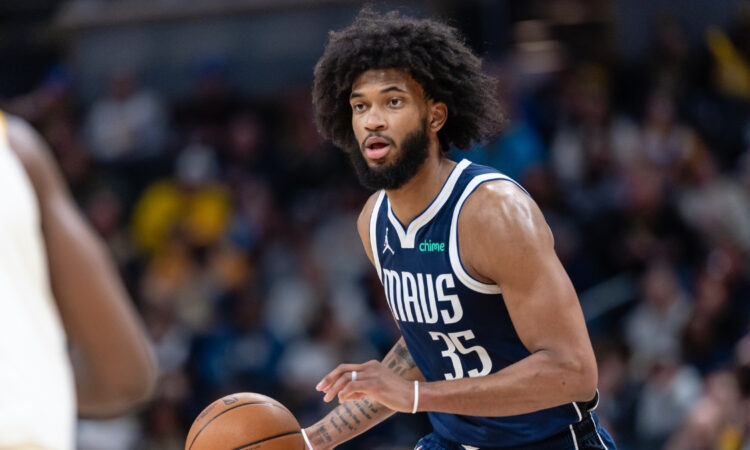 NBA: Marvin Bagley III dribbles the ball for the Dallas Mavericks against the Indiana Pacers at Gainbridge Fieldhouse.