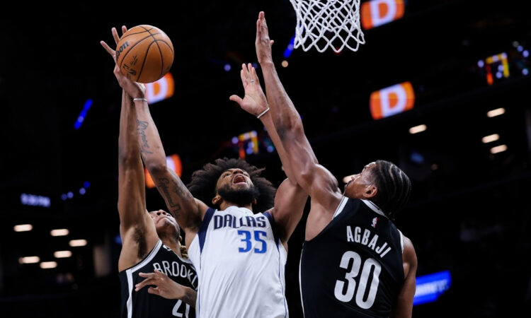 NBA: Marvin Bagley III shoots the ball for the Dallas Mavericks against the Brooklyn Nets at Barclays Center in New York.