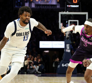 NBA: Naji Marshall of the Dallas Mavericks drives to the basket against the Minnesota Timberwolves at Target Center